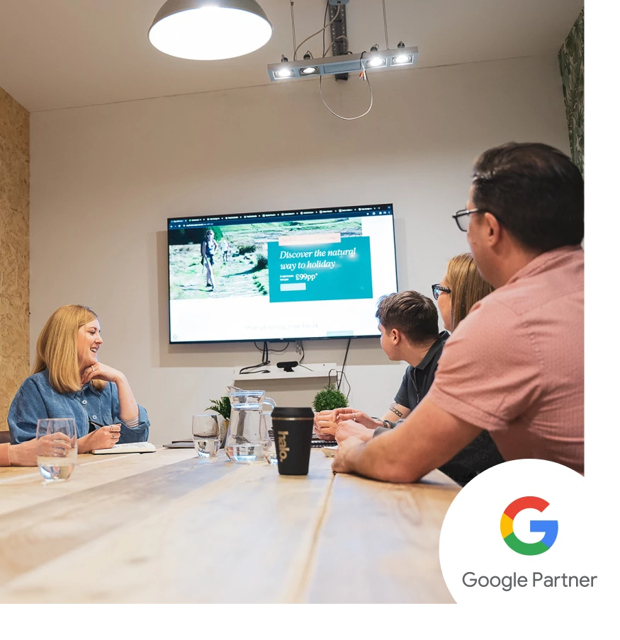 Nick, Claire, Tiff and Josh sat in the meeting room talking about a development project