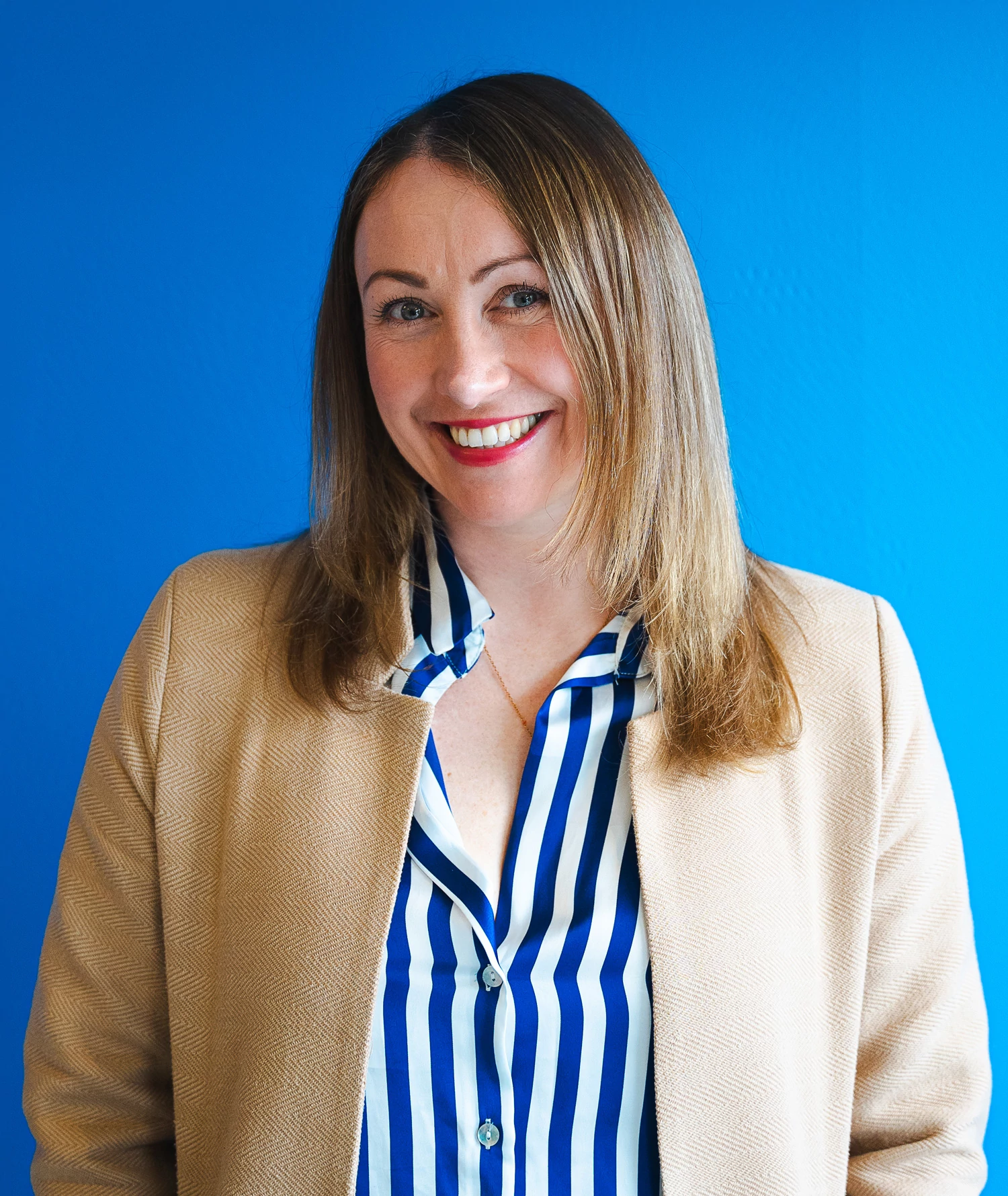 Jess Bain on a blue background