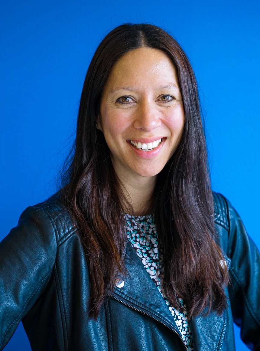 Holly Young on a blue background.