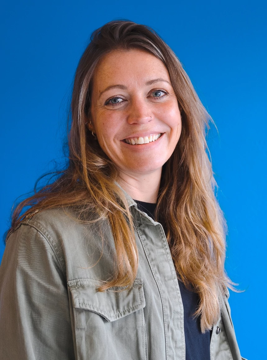 Sarah Macpherson on a blue background.