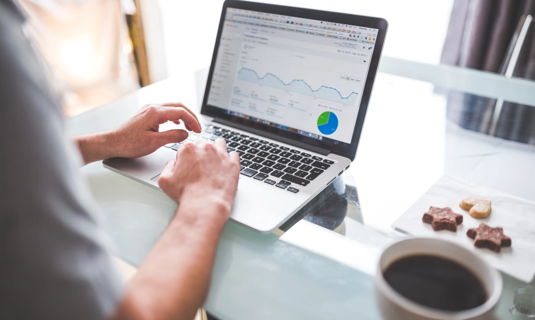 Photo of computer at desk showing PPC trends in 2024